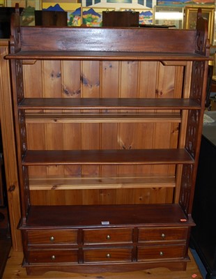 Lot 1252 - A reproduction hardwood four-tier hanging wall...