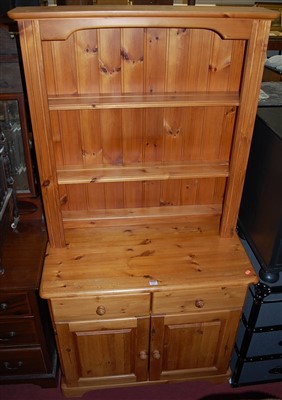 Lot 1253 - A modern pine round cornered narrow kitchen...