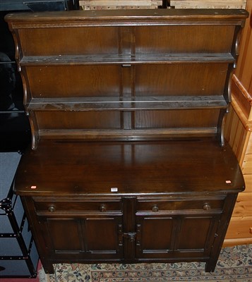 Lot 1258 - An Ercol dark elm dresser, width 121cm