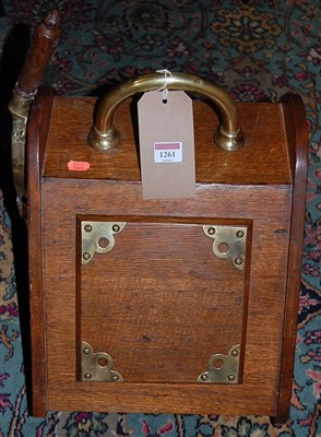 Lot 1261 - A late Victorian oak and brass mounted coal...