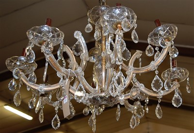 Lot 1263 - A cut crystal glass eight light hanging...