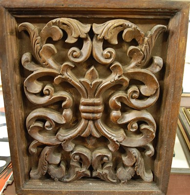 Lot 1058 - A relief carved softwood panel, 46 x 39cm
