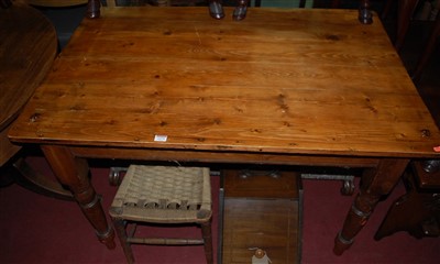 Lot 1273 - A stained pine round cornered plank top...