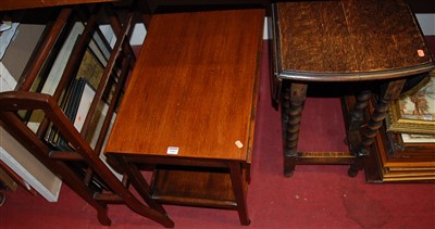 Lot 1084 - An oak gateleg table, on barleytwist supports;...