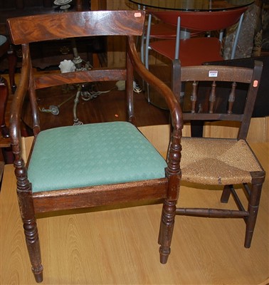 Lot 1307 - A 19th century mahogany bar back elbow chair,...