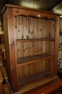 Lot 1310 - A modern pine low freestanding open bookshelf...