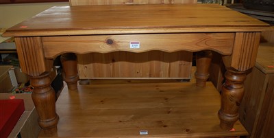 Lot 1315 - A modern pine rectangular low coffee table on...