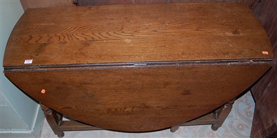 Lot 1365 - An 18th century joined oak drop leaf dining...