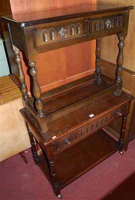 Lot 1388 - A moulded oak single drawer two-tier...