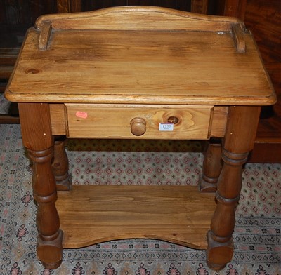 Lot 1377 - A modern pine ledgeback two-tier single drawer...