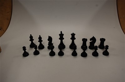 Lot 521 - A turned boxwood and ebony chess set, in the...