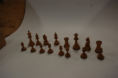 Lot 521 - A turned boxwood and ebony chess set, in the...