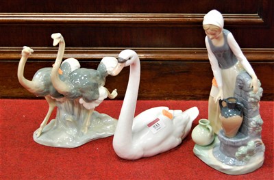 Lot 533 - A Lladro porcelain figure of a swan together...