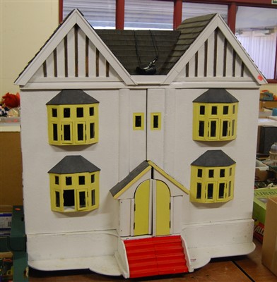 Lot 1483 - A hand made twin door open front dolls house,...