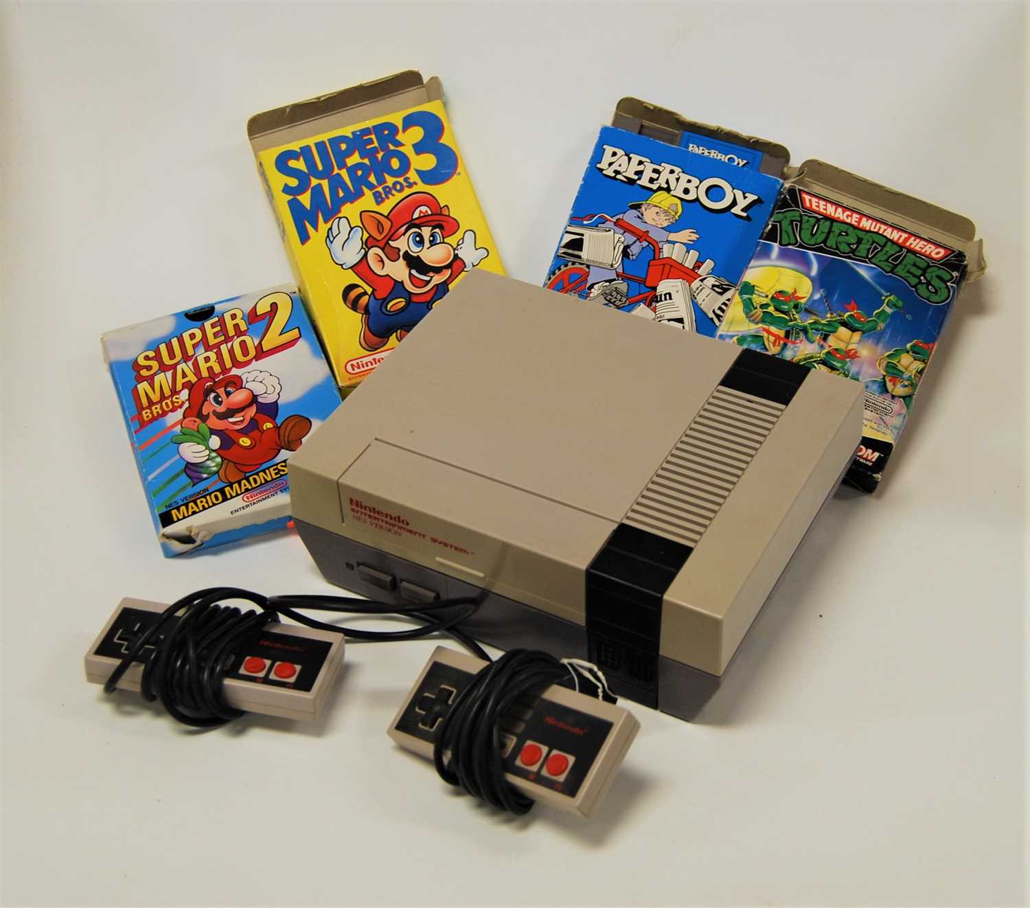 Lot 487 - A Nintendo Entertainment System with two...