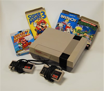 Lot 487 - A Nintendo Entertainment System with two...