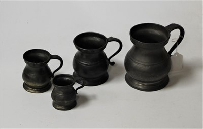 Lot 36 - An 18th century pewter pint tankard with...