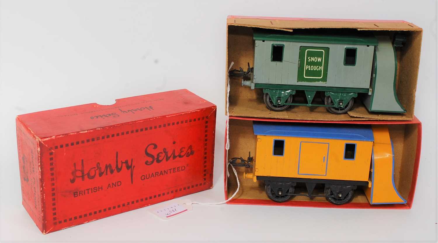 Lot 185 - Two Hornby snow ploughs: 1930-2 plain, green...