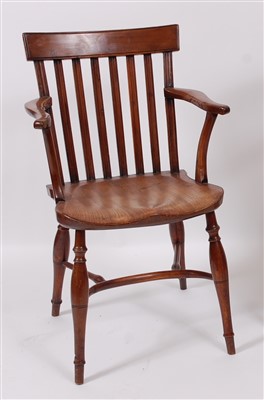 Lot 2559 - A 19th century English fruitwood and elm seat...