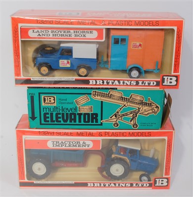 Lot 1248 - A Britains farm 1/32 scale boxed tractor and...