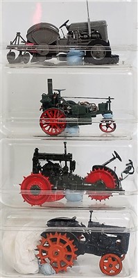 Lot 1251 - Four various diecast white metal and resin...