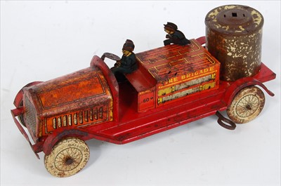 Lot 3197 - An early 20th century tinplate and clockwork...