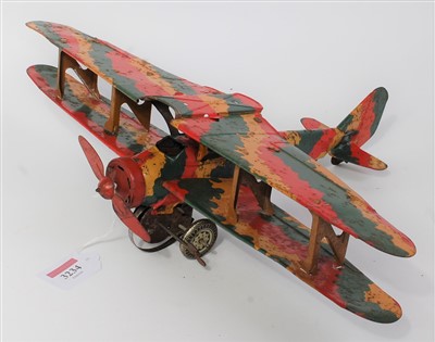 Lot 3234 - A Mettoy tin plate clockwork bi-plane fitted...