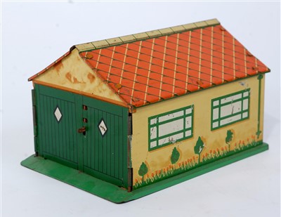 Lot 2033 - A Dinky Toys pre-war No. 45 garage, comprising...