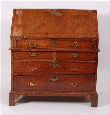 Lot 2511 - A mid-18th century walnut writing bureau, the...