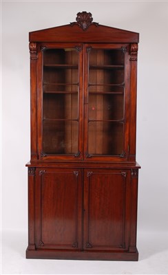 Lot 2535 - A William IV mahogany bookcase cabinet, having...