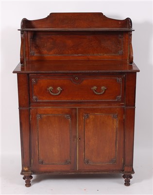 Lot 2534 - A late Regency mahogany secretaire, having...