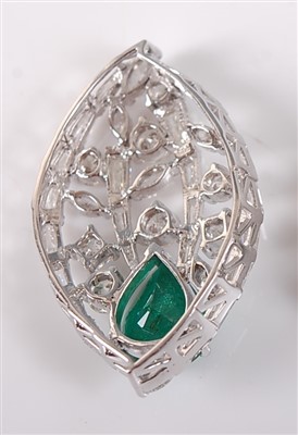Lot 2147 - A white metal, emerald and diamond leaf shaped...