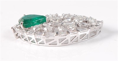 Lot 2147 - A white metal, emerald and diamond leaf shaped...