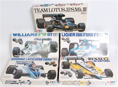 Lot 1435 - Five various boxed as issued Tamiya 1/20 scale...