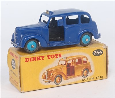 Lot 2055 - Dinky Toys, 254, Austin Taxi, comprising rare...