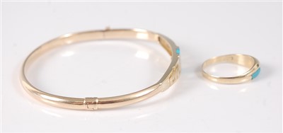 Lot 2171 - A yellow metal bangle and ring set, the oval...