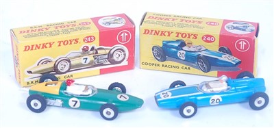 Lot 2063 - A Dinky Toys boxed racing car diecast group to...