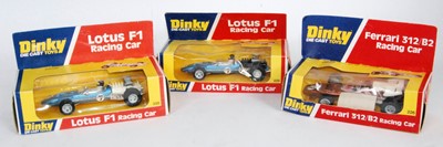 Lot 2064 - A Dinky Toys boxed racing car diecast group to...