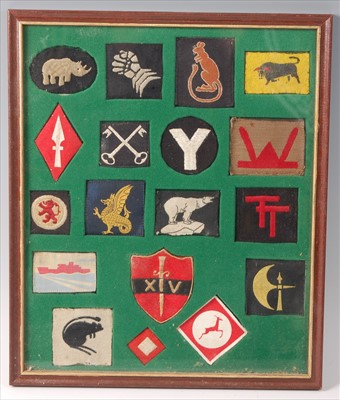 Lot 117 - A collection of British Army cloth formation signs to include