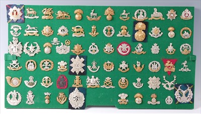 Lot 120 - A collection of British Army cap badges and insignia