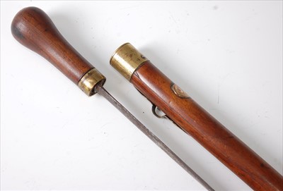 Lot 131 - A 19th century teak customs officer's sword stick