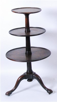 Lot 2564 - A George III mahogany three-tier dumb waiter,...