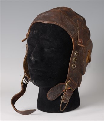 Lot 98 - A WW II R.A.F. Type C brown leather flying helmet