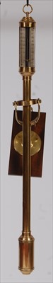 Lot 2474 - A contemporary brass gimballed ships stick...