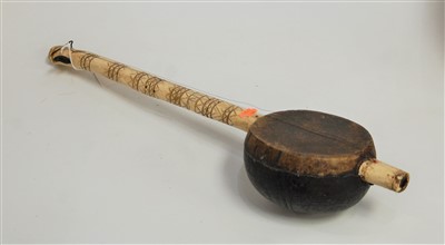 Lot 32 - A carved bone coconut and hide covered erhu,...