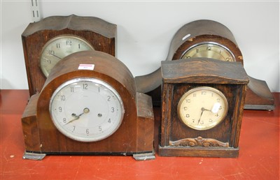 Lot 40 - A 1950s Enfield oak cased mantel clock, having...