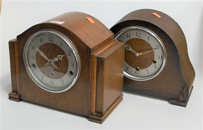 Lot 55 - A 1940s oak cased Enfield mantel clock, having...