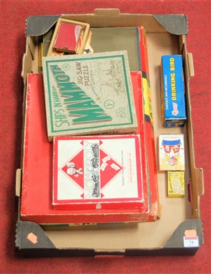 Lot 74 - A box of miscellaneous childrens toys and...