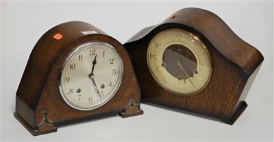 Lot 114 - A 1950s oak cased mantel clock having a...