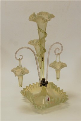 Lot 161 - A Victorian three trumpet vaseline glass table...